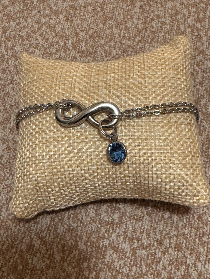 Stainless Steel Infinity Bracelet with Blue Crystal Charm – Double Strand